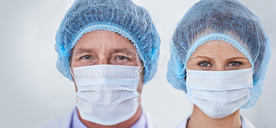 Buy stock photo Face mask, doctors and portrait with surgery and safety gear for healthcare and wellness job. Hospital, ppe and people in clinic with working and health protocol in facility with care and staff  