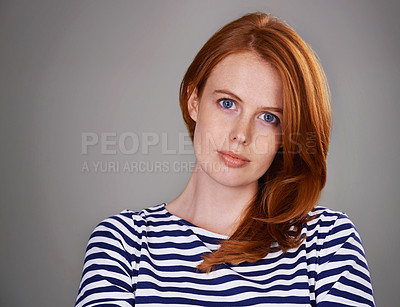 Buy stock photo Serious, gray background and portrait of business woman with red hair for career, work and job. Professional, ginger and isolated person with confidence, company pride and positive attitude in studio
