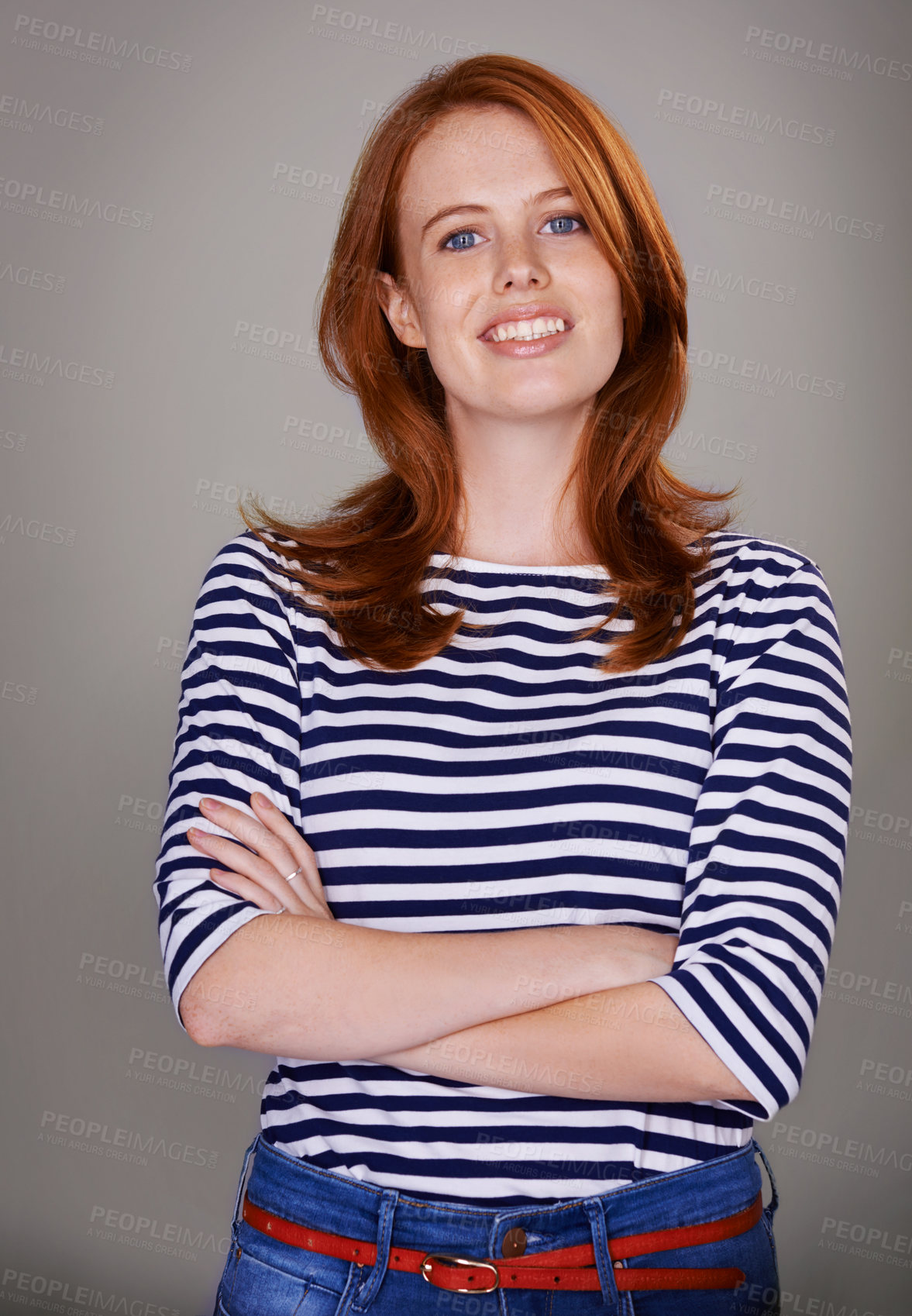Buy stock photo Studio portrait of an attractive woman against a gray background