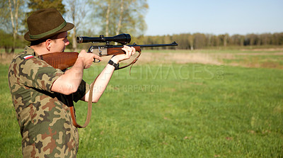 Buy stock photo Hunter, gun and man in nature with mockup on a Africa safari for animal shooting with a weapon. Hunting sport, male person and target hunt practice of a traveler in camouflage looking at a scope