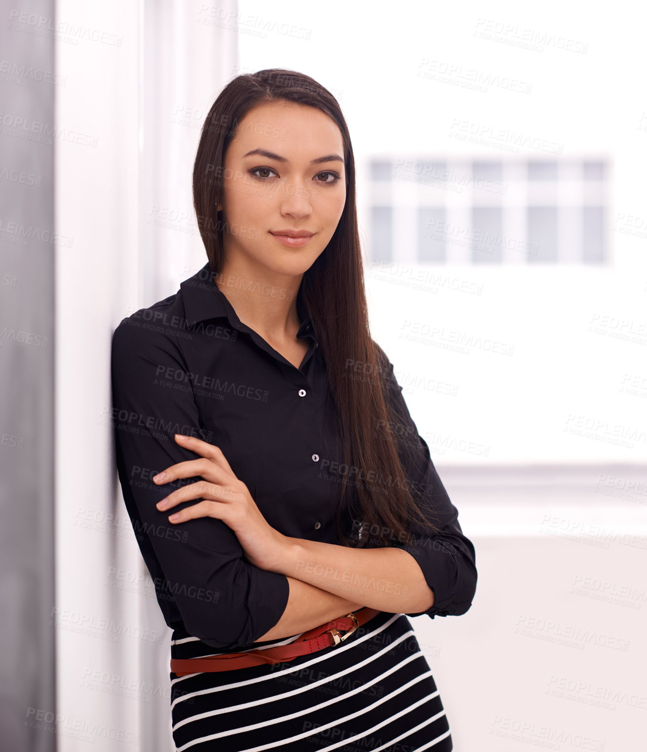 Buy stock photo Shot of a young businesswoman in her office