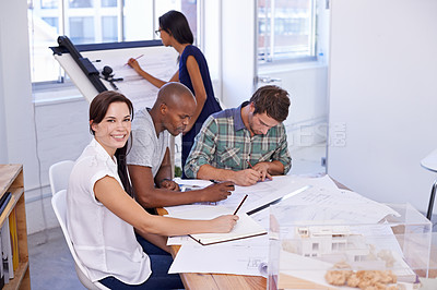 Buy stock photo Happy woman, creative and portrait with architect team for meeting, planning or architectural design at office. Designer with smile, documents or paperwork in group project or startup at workplace