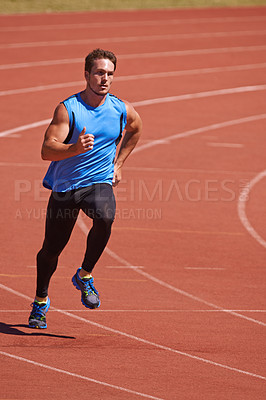 Buy stock photo Man, athlete and running on race track with speed, fitness and cardio for sports and action outdoor. Exercise, workout and training at stadium or arena, moving for health with fast runner or sprinter