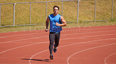 Buy stock photo Man, athlete and running on race track for sports, fitness and cardio with speed and action outdoor. Exercise, workout and training at stadium or arena, moving for health with fast runner or sprinter