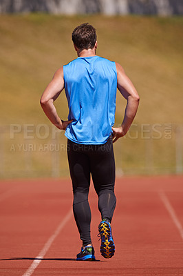 Buy stock photo Running track, fitness and man outdoor for marathon, training or intense morning cardio routine, Exercise, back and male runner at sports stadium for athletic, speed or challenge, performance or race