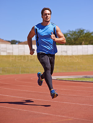 Buy stock photo Man, sport and running on race track with speed, fitness and cardio with athlete and action outdoor. Exercise, workout and training at stadium or arena, moving for health with fast runner or sprinter
