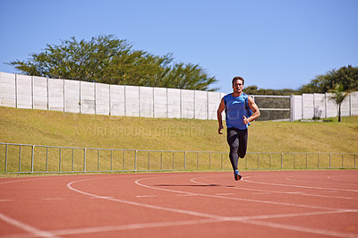 Buy stock photo Man, sports and run on race track with speed, fitness and cardio with athlete and action outdoor. Exercise, workout and training at stadium or arena, moving for health with fast runner or sprinter