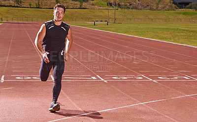 Buy stock photo Man, sport and running on race track for fitness, speed and cardio with athlete and action outdoor. Exercise, workout and training at stadium or arena, moving for health with fast runner or sprinter