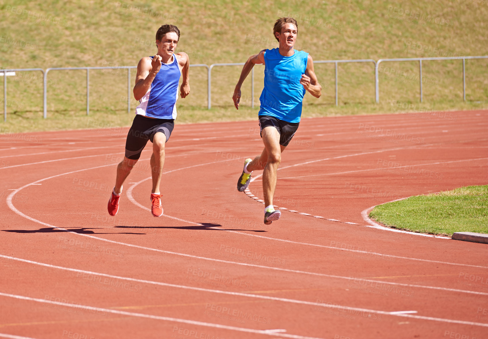 Buy stock photo Race track, running and fitness men outdoor for marathon, training or intense morning cardio. Exercise, action and runners at sports stadium for athletic contest, speed or performance challenge