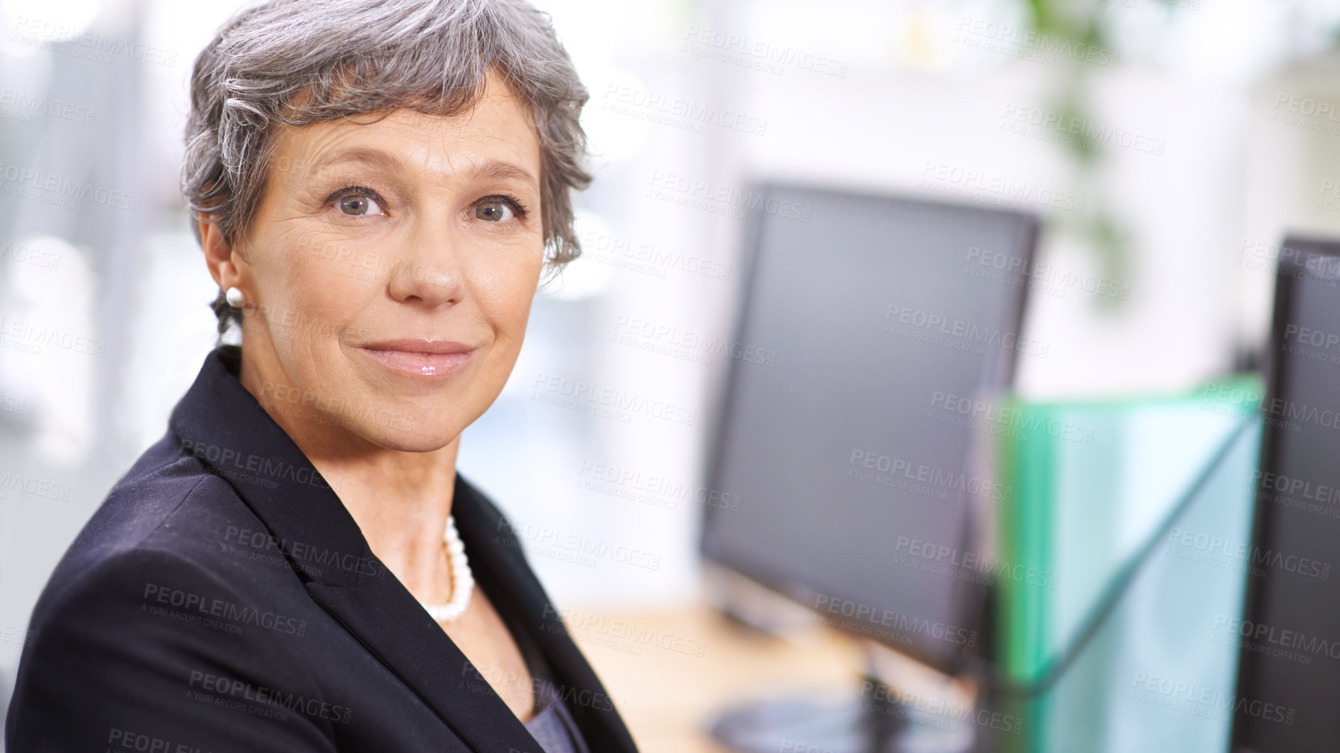 Buy stock photo Portrait of a mature woman  sitting in an office