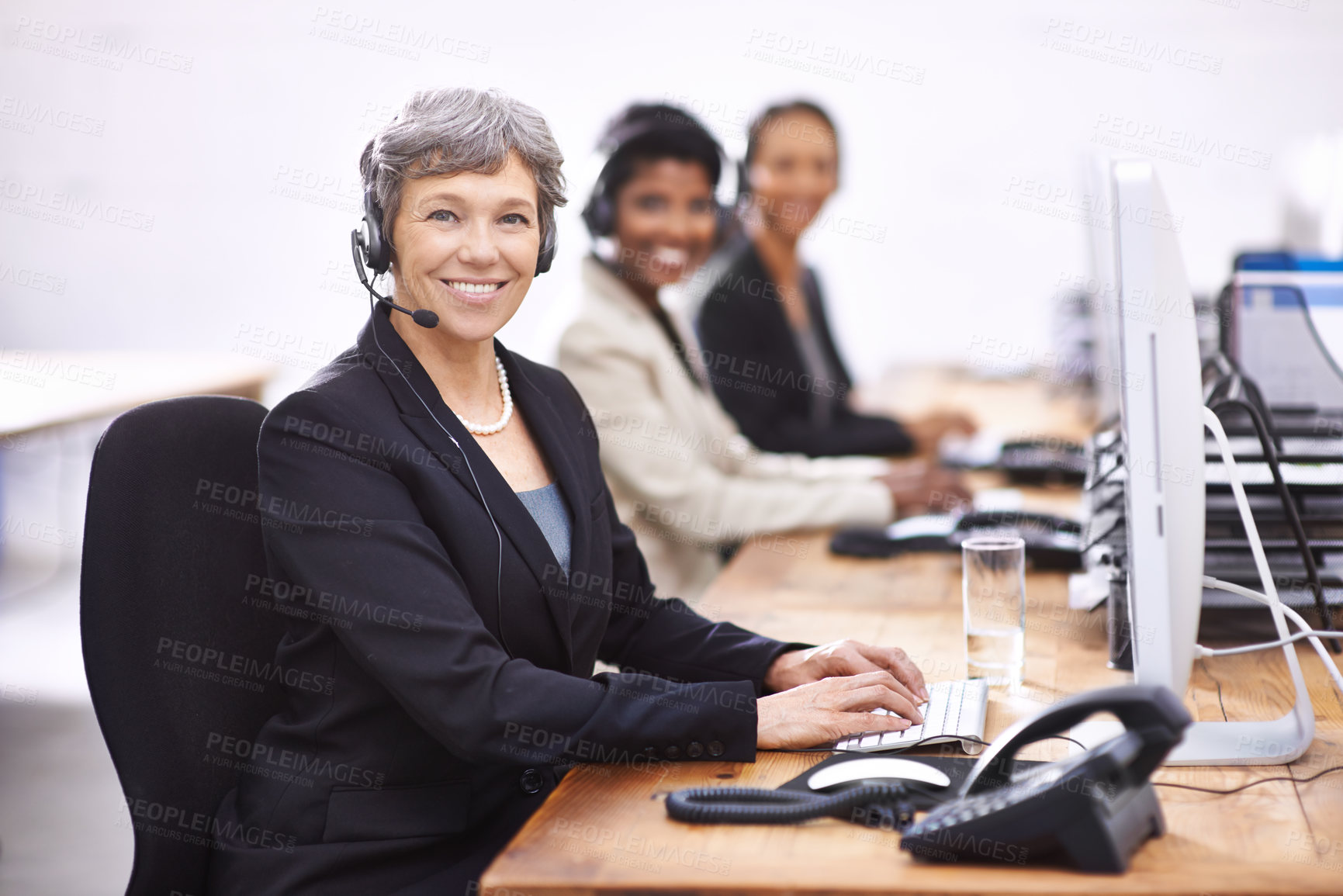 Buy stock photo Call center, portrait and mature woman with team in office for crm training, learning or mentorship. Telemarketing, face or lady manager with group for customer support coaching, help or contact us 