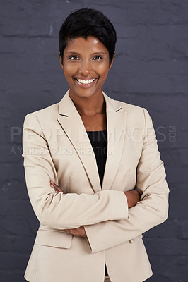Buy stock photo Indian woman, arms crossed and corporate professional with smile, pride and ambition with confidence on wall background. Happy in career, job satisfaction in business and real estate agent in Mumbai