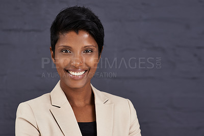 Buy stock photo Indian woman, portrait and professional in business with smile, pride and ambition with confidence on wall background. Happy in corporate career, job satisfaction and real estate agent in Mumbai