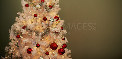 Buy stock photo Cropped studio shot of a decorated Christmas tree