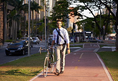 Buy stock photo Bicycle, city and portrait of happy businessman for travel, morning commute and walking to work. Professional, urban town and person with bike for cycling, sustainable and eco friendly transport
