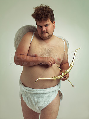 Buy stock photo An obese man dressed as a cherub while  isolated