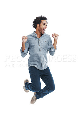 Buy stock photo Happy, excited and man jumping in studio with good news, winning and job promotion celebration. Smile, cheering and young male person with enthusiasm for positive attitude by white background.