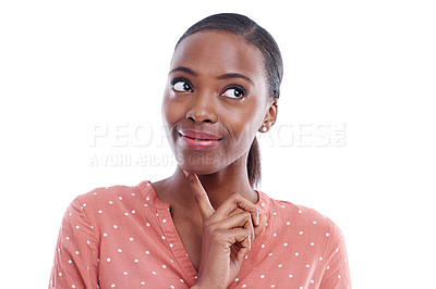 Buy stock photo Shot of an attractive young woman looking up in thought