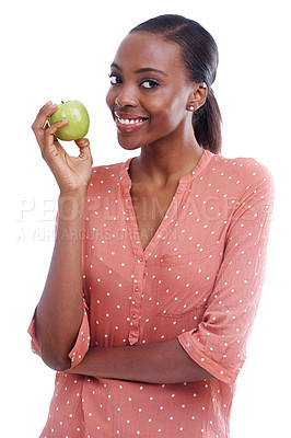 Buy stock photo Portrait of an attractive young woman holding an apple