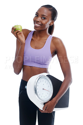 Buy stock photo Portrait, apple and scale with fitness black woman in studio isolated on white background for weight loss. Exercise, smile and diet with happy young sports model training for health or nutrition