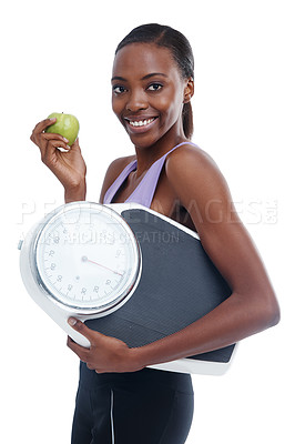 Buy stock photo Portrait, apple and scale with exercise black woman in studio isolated on white background for weight loss. Fitness, smile and diet with confident young sports model training for health or nutrition