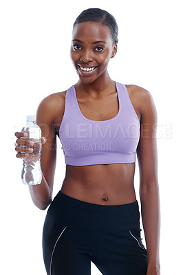 Buy stock photo An isolated portrait of a sporty young woman holding a bottle of water
