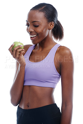 Buy stock photo Fitness, apple and wellness with happy black woman in studio isolated on white background for weight loss. Exercise, smile and fruit with confident young sports model training for health or nutrition
