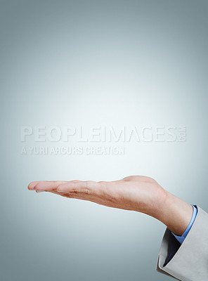 Buy stock photo Open, palm and business person with presentation, mockup and space on isolated on a grey studio background. Closeup, advertising and hand of professional with promotion or show platform for marketing