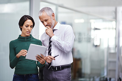 Buy stock photo Shot of businesspeople working in the office