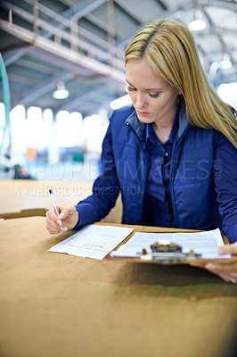 Buy stock photo Business woman, writing and checking inventory with clipboard, storage or supply chain at warehouse. Female person, job manager or employee with for documents, paperwork or distribution at factory