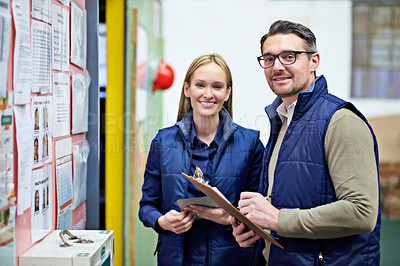 Buy stock photo Warehouse, clipboard and portrait of business people with smile for collaboration, compliance and inspection. Billboard, woman and man with checklist for report, teamwork and factory information