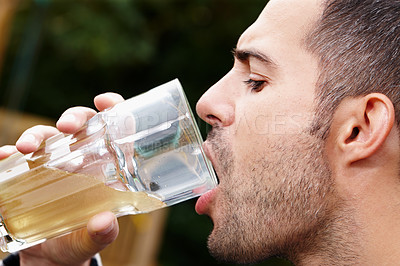 Buy stock photo Man, drinking and healthy probiotic juice for natural, organic and refreshing liquid for energy. Vegan, person and glass of kombucha beer or beverage for immune, wellness and nutrients for vitamins
