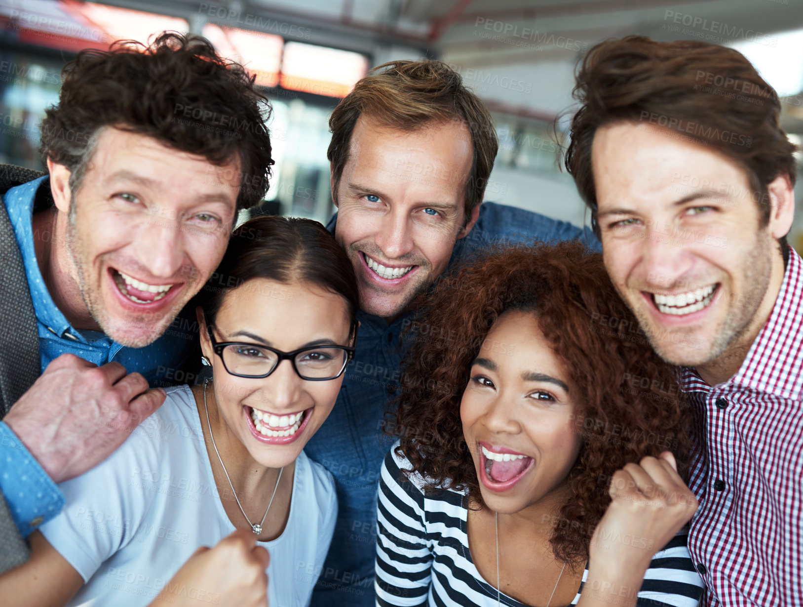 Buy stock photo Portrait of a group of ecstatic colleagues in an office