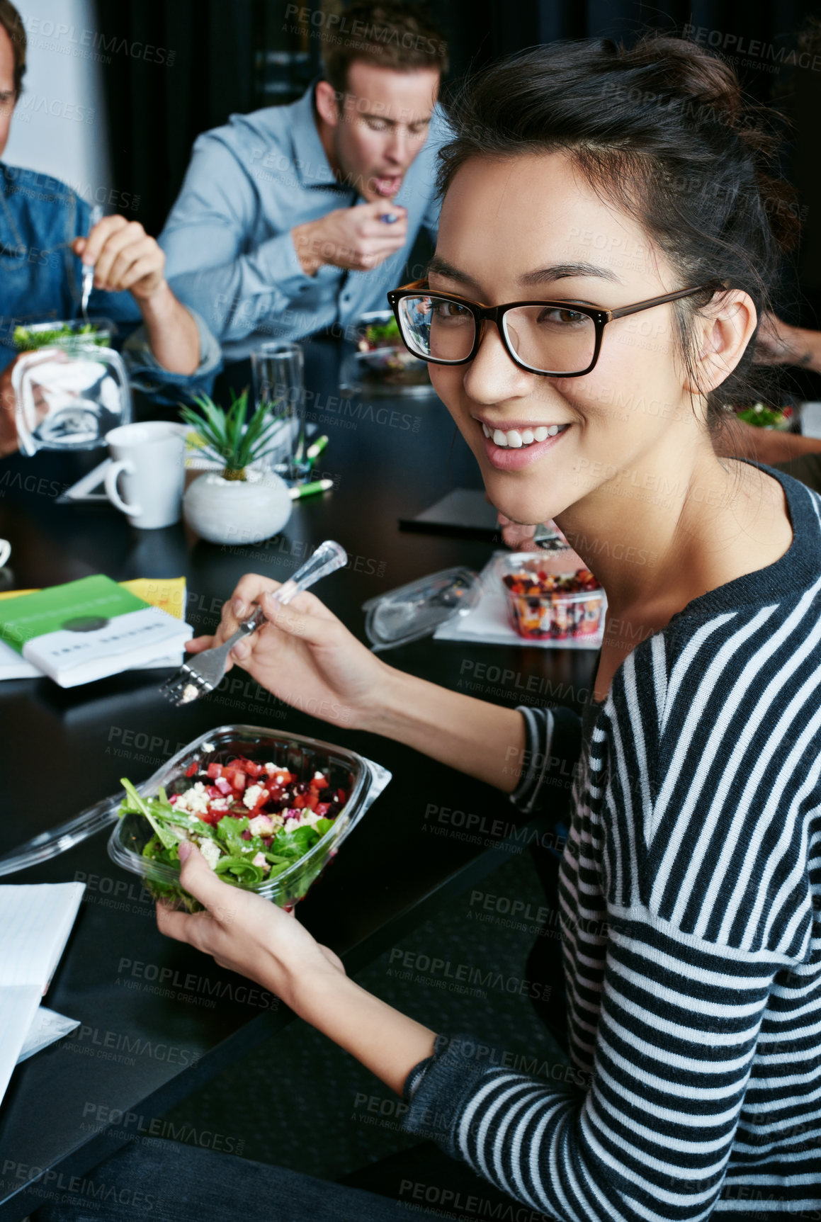 Buy stock photo Discussion, happy and portrait of woman with salad in office for team building lunch for collaboration. Meeting, smile and business with female designer with colleagues eating healthy in workplace
