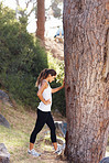 Pretty young woman stretching