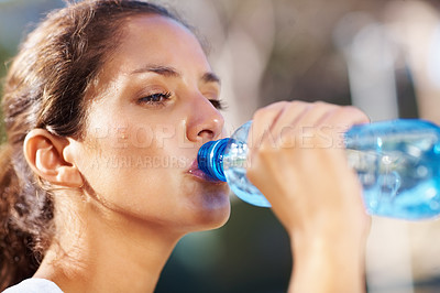 Buy stock photo Fitness, woman and drinking water outdoor for running, wellness or training in a park. Sports, liquid and face profile of female runner outside for exercise, workout or morning cardio run in a forest