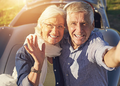 Buy stock photo Mature, couple and happy selfie in car to travel on road trip or excited in retirement together. Holiday, journey and drive in summer in luxury vehicle or transport on vacation adventure with energy