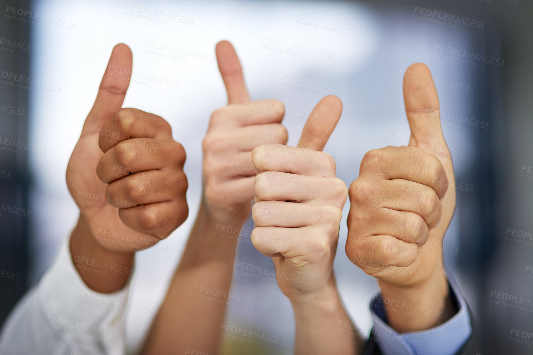 Buy stock photo Shot of a group of unrecognizable businesspeople pulling thumbs up