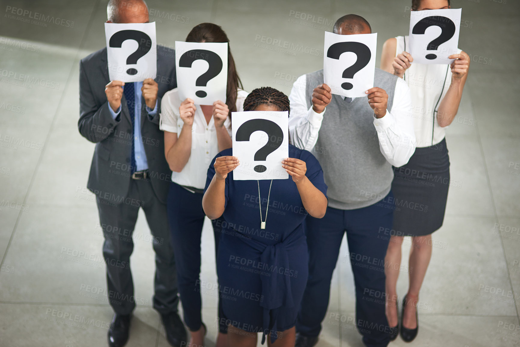 Buy stock photo Doubt, paper and group of business people with question mark for career security, recruitment or employment equality. Confused, men and women in office with ideas, job search and affirmative action
