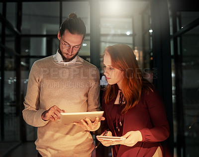 Buy stock photo Man, tablet and office in night with woman, planning or web design with check, notebook and team strategy. Teamwork, it goals and ux designer group for ideas, vision and dark workplace for analysis