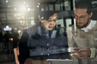 Buy stock photo Dark business, people and teamwork on tablet for planning, research and collaboration in night office. Diversity men, digital technology and working late online in agency, evening strategy or web app