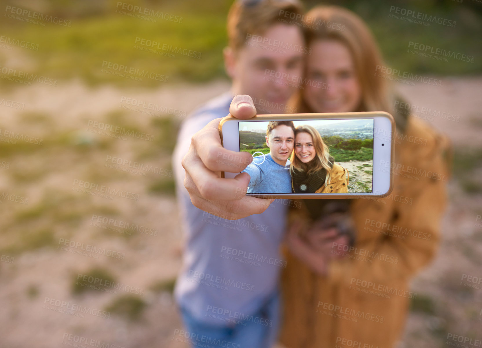 Buy stock photo Phone screen, couple and selfie outdoor for holiday, vacation or summer travel together in nature. Smartphone photography, man and woman with happy memory for social media, adventure or hiking date