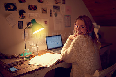Buy stock photo Portrait of a young woman using her laptop in her bedroom at night