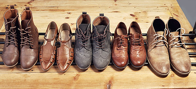 Buy stock photo High angle shot of a selection of shoes lined up together