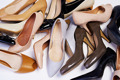 Buy stock photo Cropped shot of a selection of high heel shoes against a white background