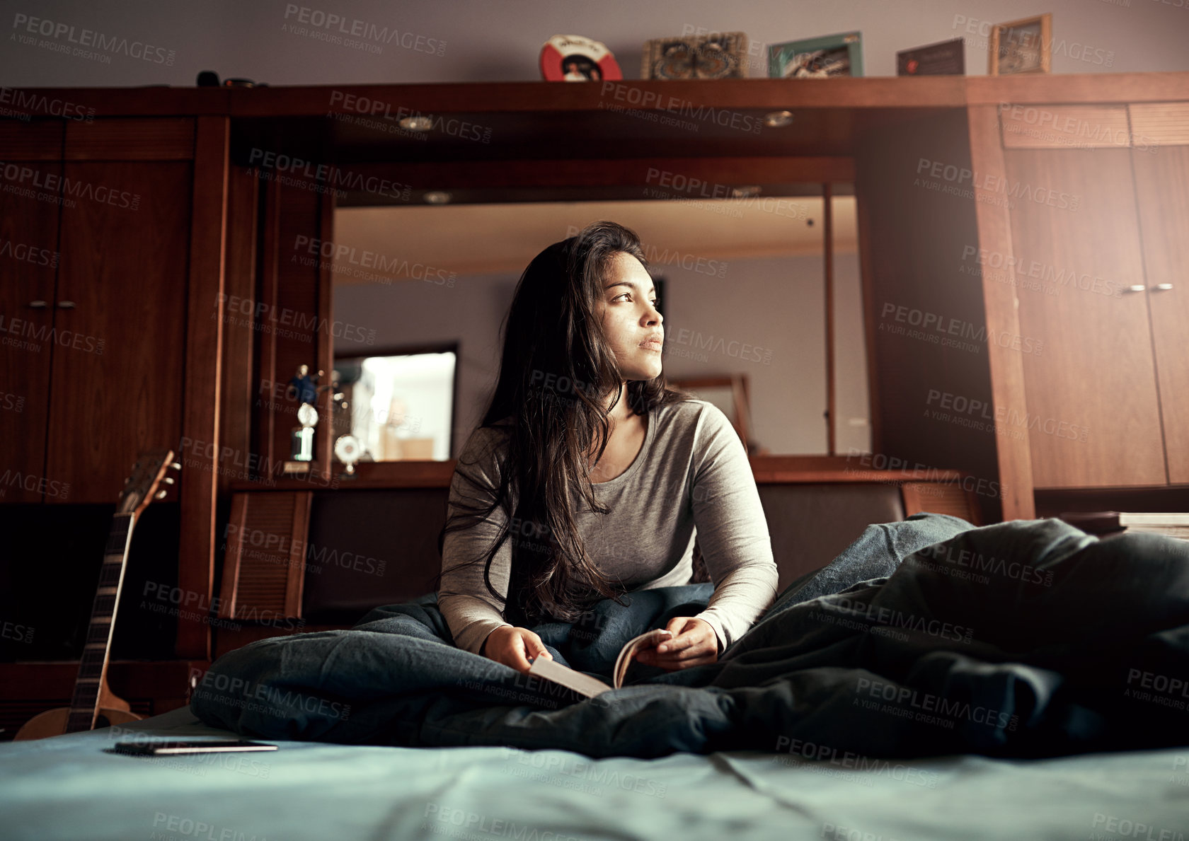 Buy stock photo Woman, thinking and bed with book in home for peace in reading, fantasy story and learning poetry. Duvet, relax and person with novel in house for literature idea, reflection or perception on weekend