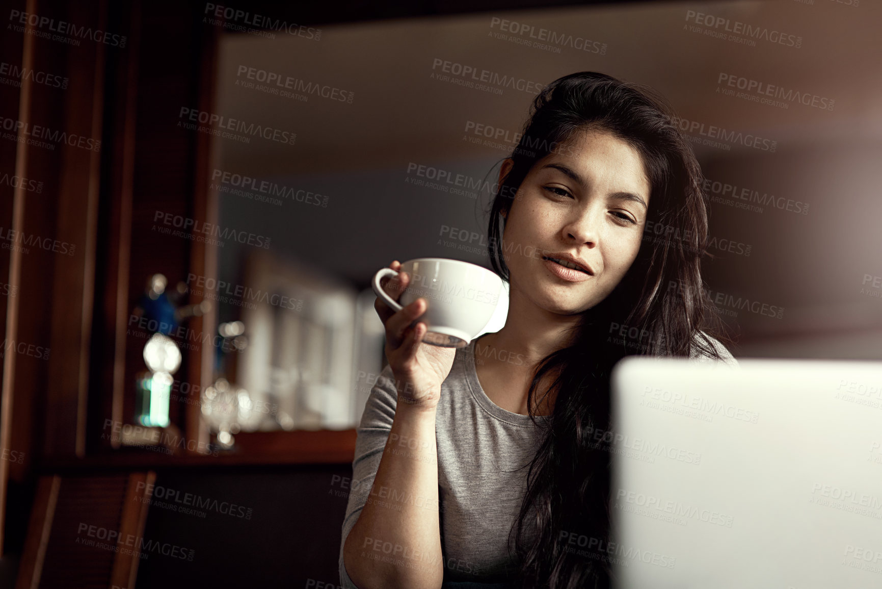 Buy stock photo Relax, woman and cup of coffee with laptop for morning entertainment on weekend or online blog read. Female person, smile and beverage in hand for break in home, internet search and streaming