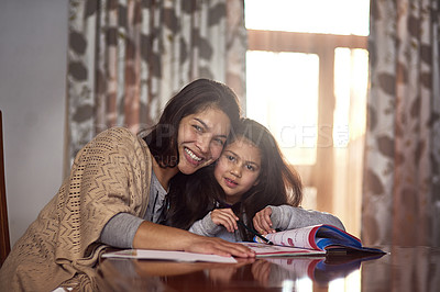 Buy stock photo Mother, kid and portrait with book on table for homework, knowledge and support in education. Happy, family and woman with girl in house for child development, homeschool learning or help in studying