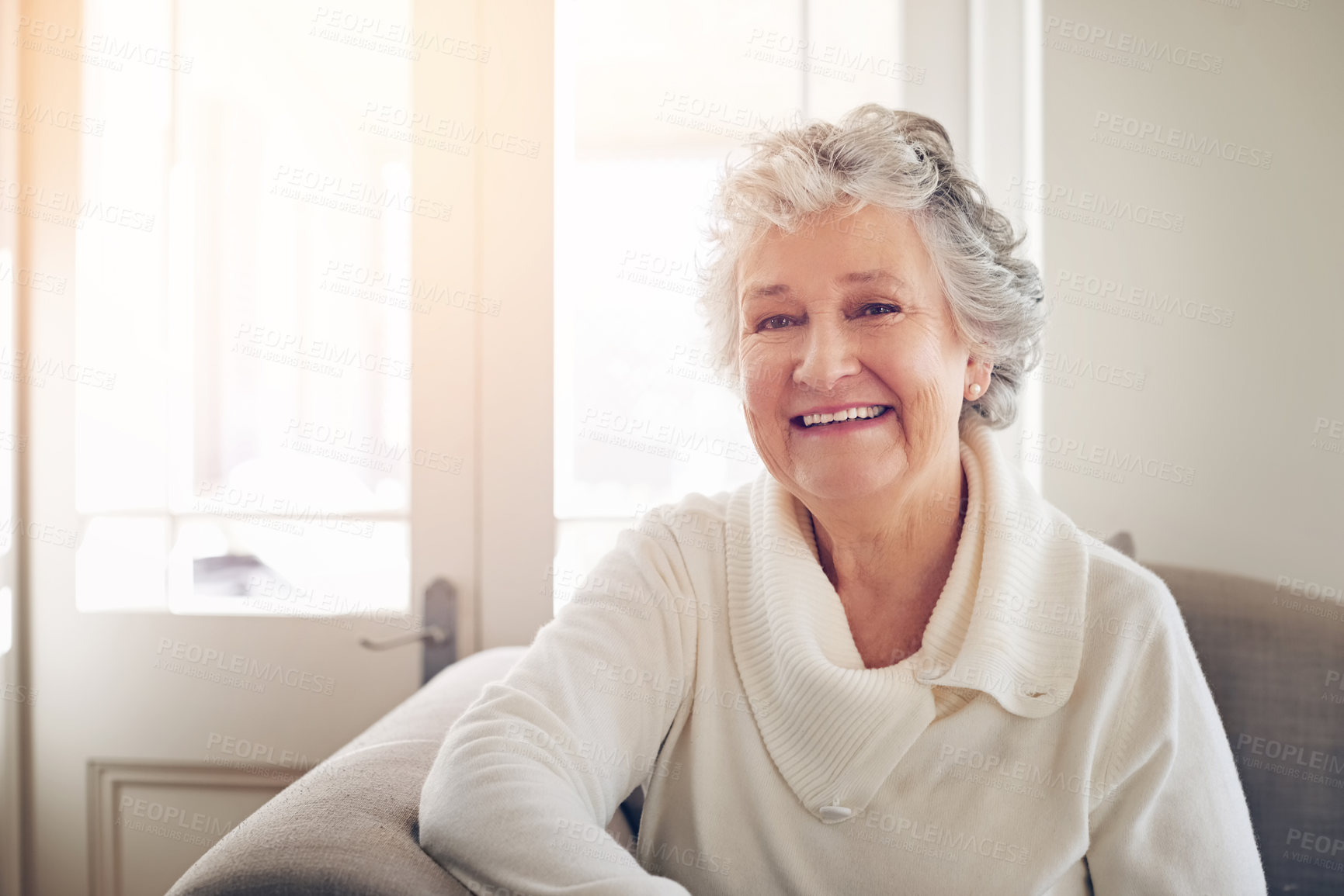 Buy stock photo Portrait of a senior woman relaxing at home