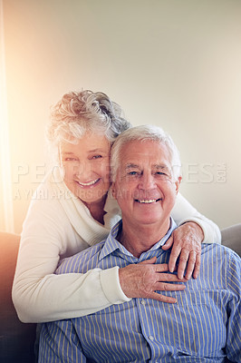 Buy stock photo Portrait of a senior couple relaxing at home